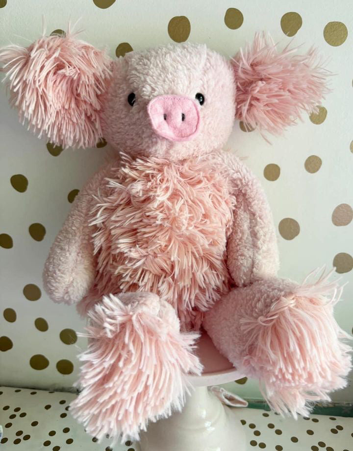 Light pink on pink plush pig